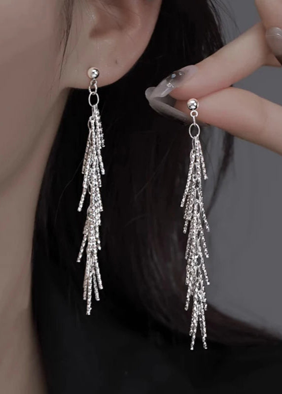 Boucles d'oreilles pompon Dense